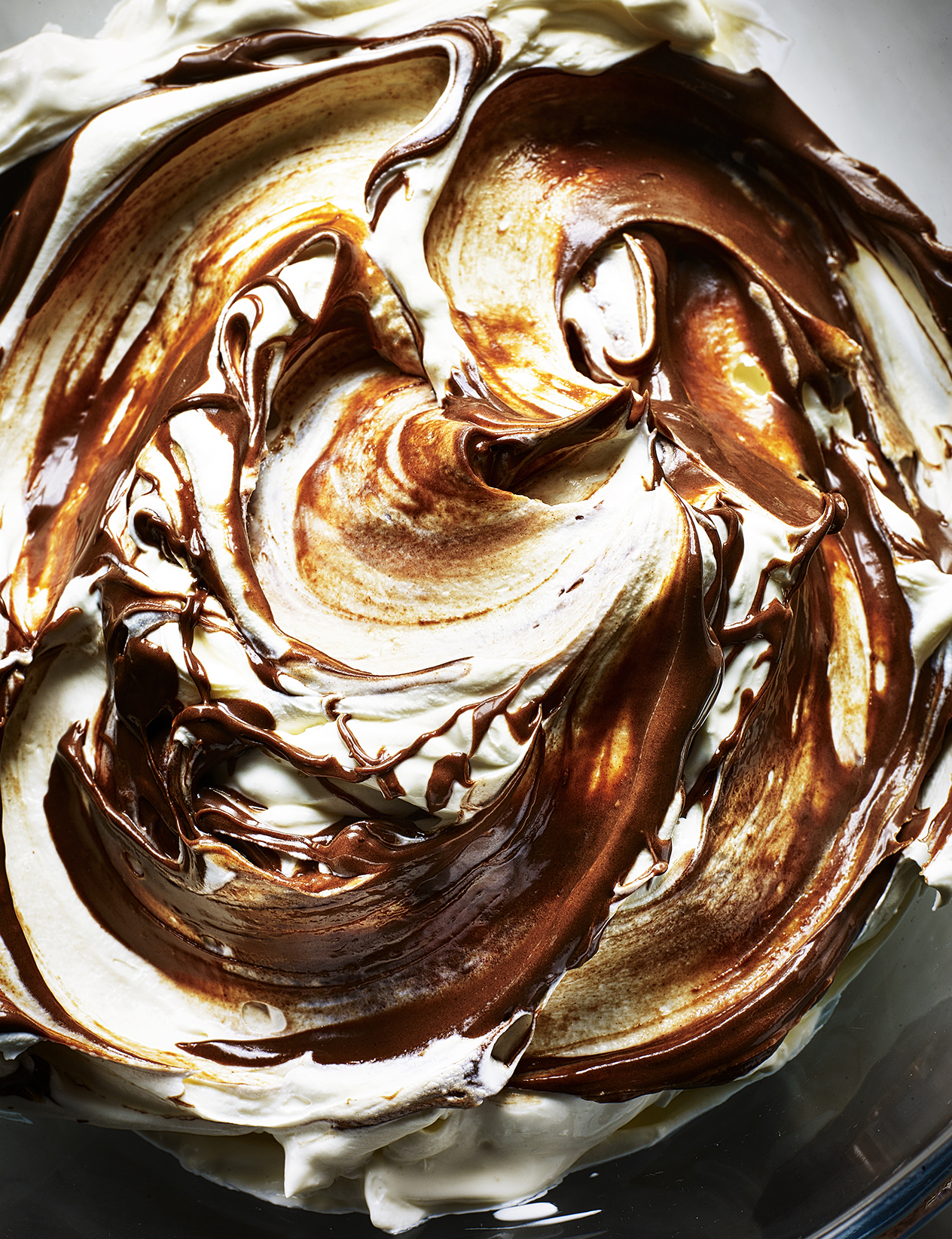 Food photography showing a swirl of chocolate and cream
