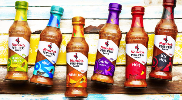 Food photography for advertising showing a selection of sauces from the Nando range, displaying the smaller 125ml bottles available to buy