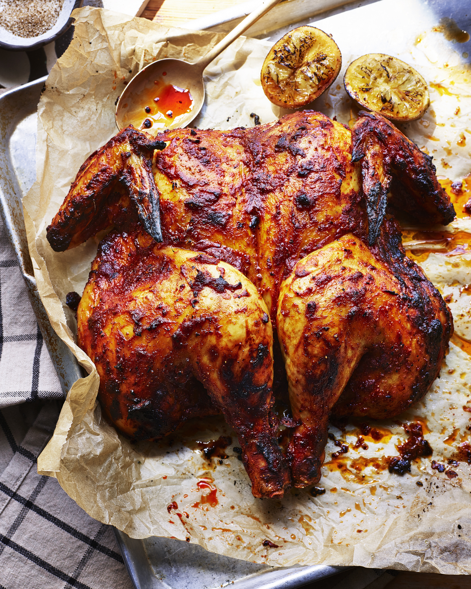 Food photography bloody Mary whole chicken on a roasting tray